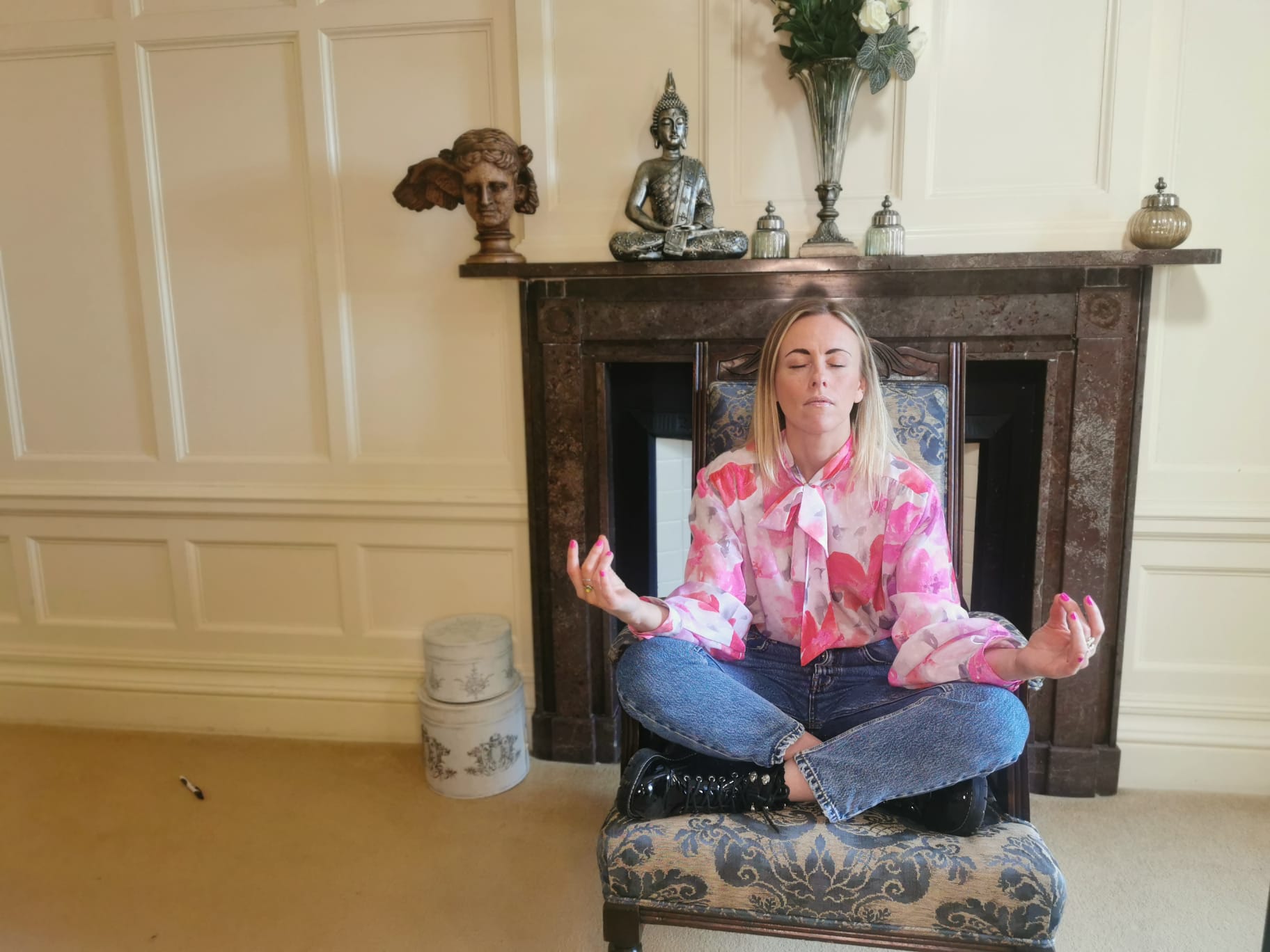 A Vet Empowered founder sitting cross legged in stillness before a session.